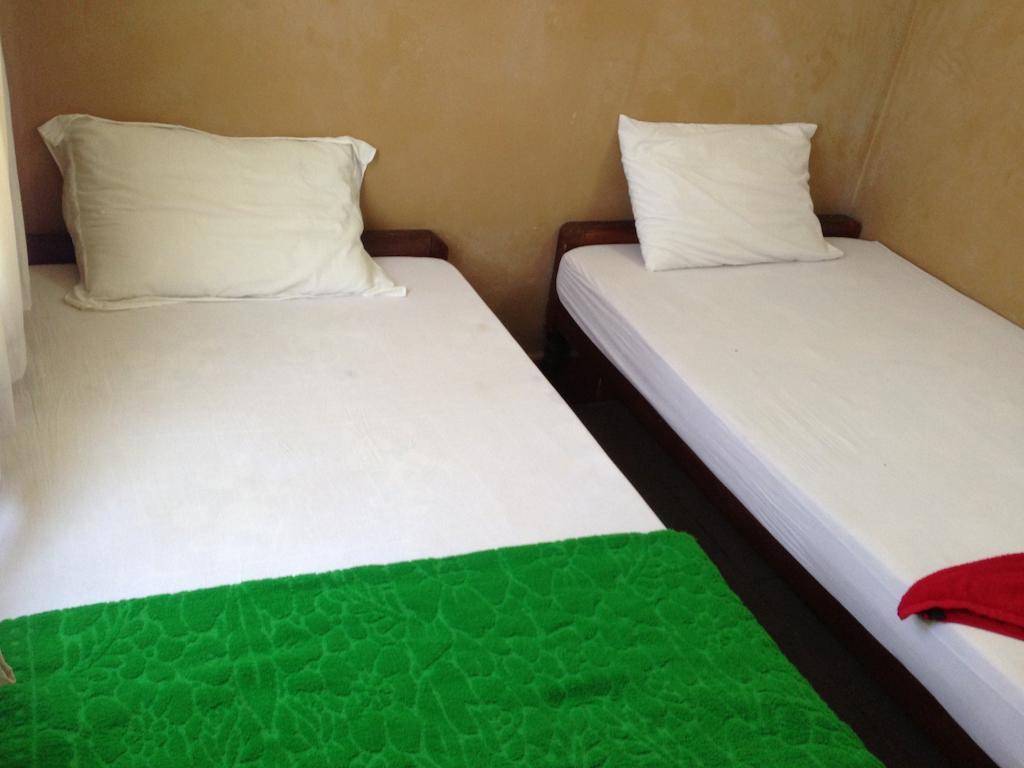 Grand View Guesthouse Phnom Penh Quarto foto